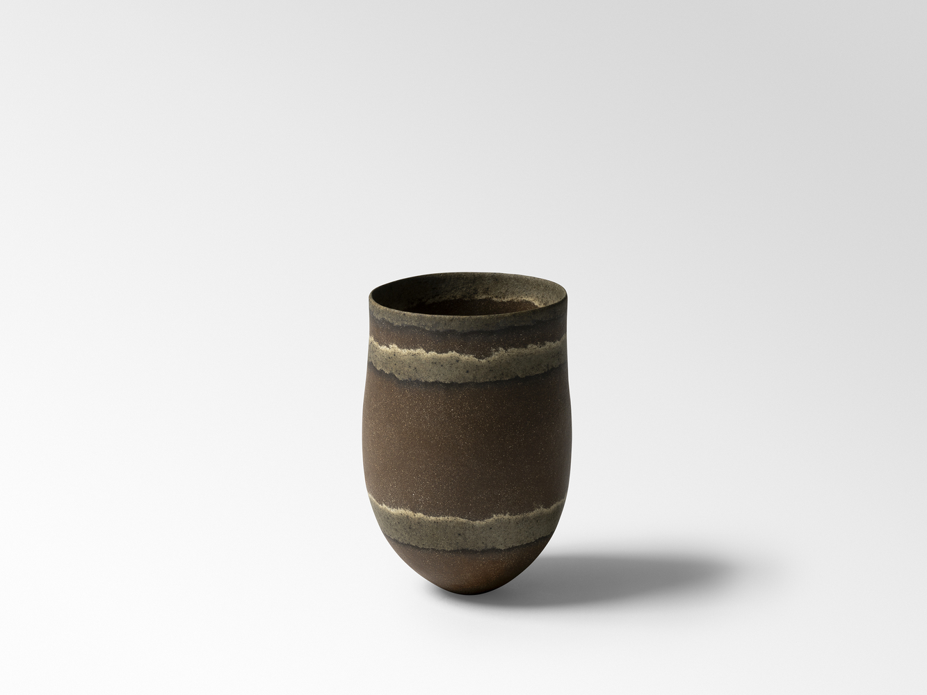Umber, two haloed olive specked bands, olive rim, 2023